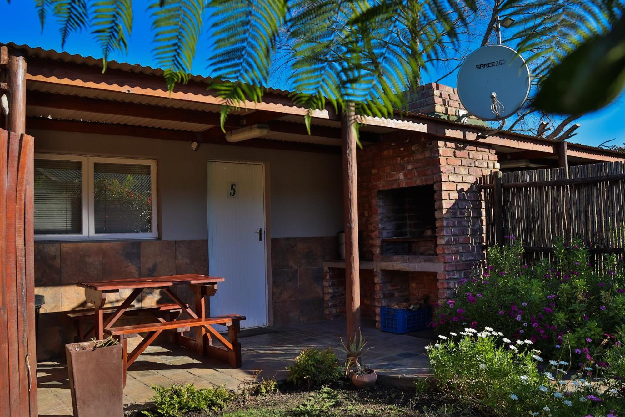 Mountain Breeze Log Cabins Stormsrivier Bagian luar foto