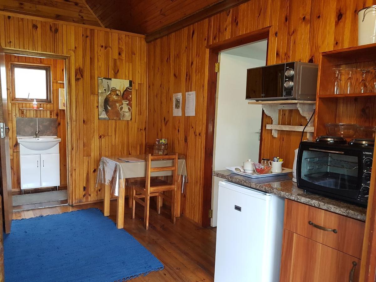 Mountain Breeze Log Cabins Stormsrivier Bagian luar foto