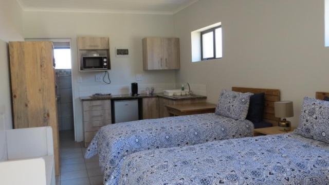 Mountain Breeze Log Cabins Stormsrivier Bagian luar foto
